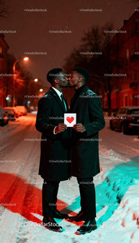 Affectionate LGBTQ Couple Sharing a Kiss in Snowy Night