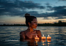 Woman in Black Bikini with Candles Floating in Lake at Sunset