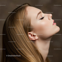Profile of serene woman with long flowing hair
