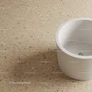 White cylindrical trash bin in modern minimalist interior