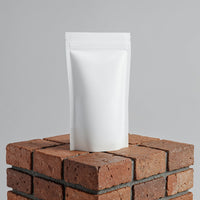 Minimalist White Pouch on Rustic Brick Surface