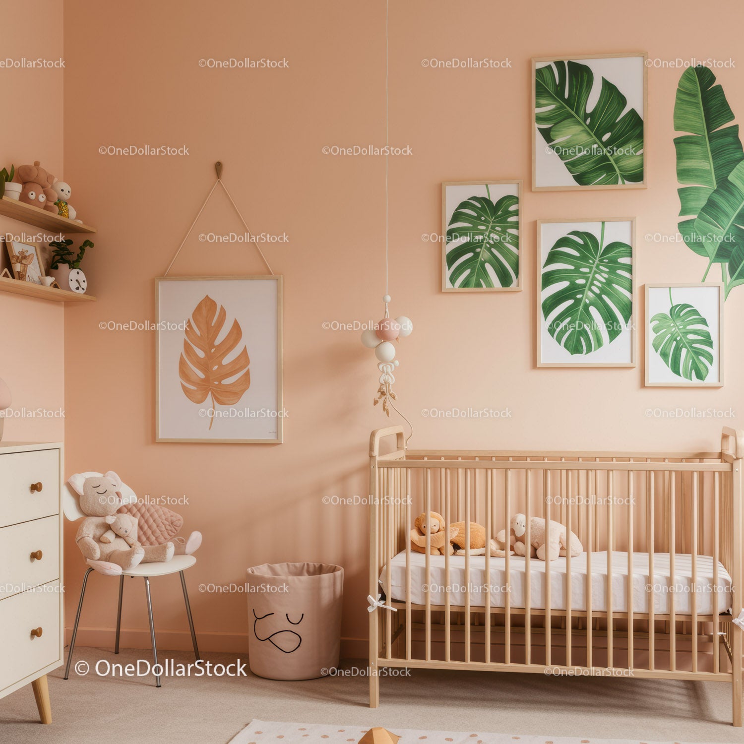 Minimalist Nursery with Green Monstera Leaf Wall Art and Pastel Pink Walls