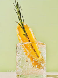 Refreshing citrus and rosemary herb iced in glass block