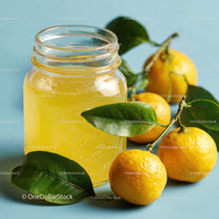 Refreshing Orange Juice in Glass Jar with Fresh Citrus Fruits
