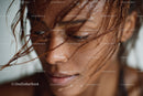 Close-up of Smiling Woman with Wet Skin and Water Droplets Outdoors