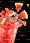 Refreshing watermelon splash with ice cubes and mint leaves