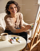 Young Woman Enjoying Painting in Cozy Sunlit Room