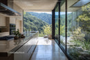 Modern Kitchen with Mountain View and Large Glass Doors