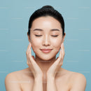 Portrait of a Smiling Woman with Flawless Porcelain Skin in Calm Mood