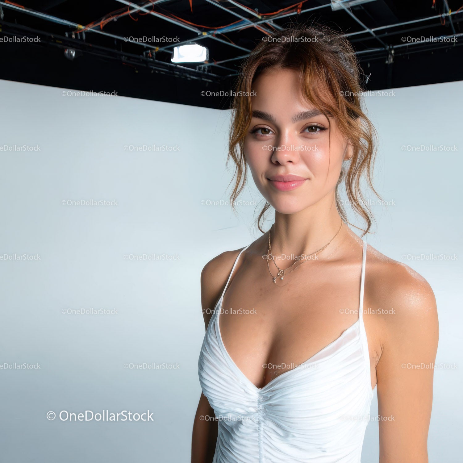Young Woman Smiling in White Dress against Studio Background