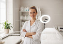 Female Healthcare Professional Standing Confidently in Modern Medical Clinic