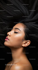 Portrait of serene woman with flowing black hair