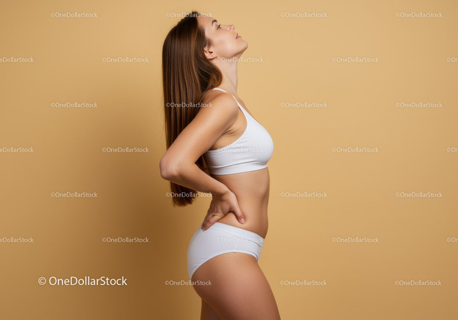 Fitness Model in White Sportswear Posing Confidently Against Yellow Background