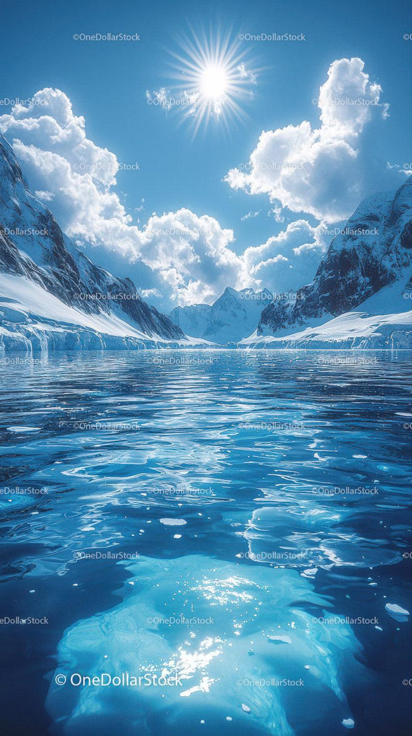 Majestic Snow-Covered Mountain Range with Bright Sun and Glacial Waters