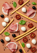 Italian antipasto arrangement with ham and fresh mozzarella