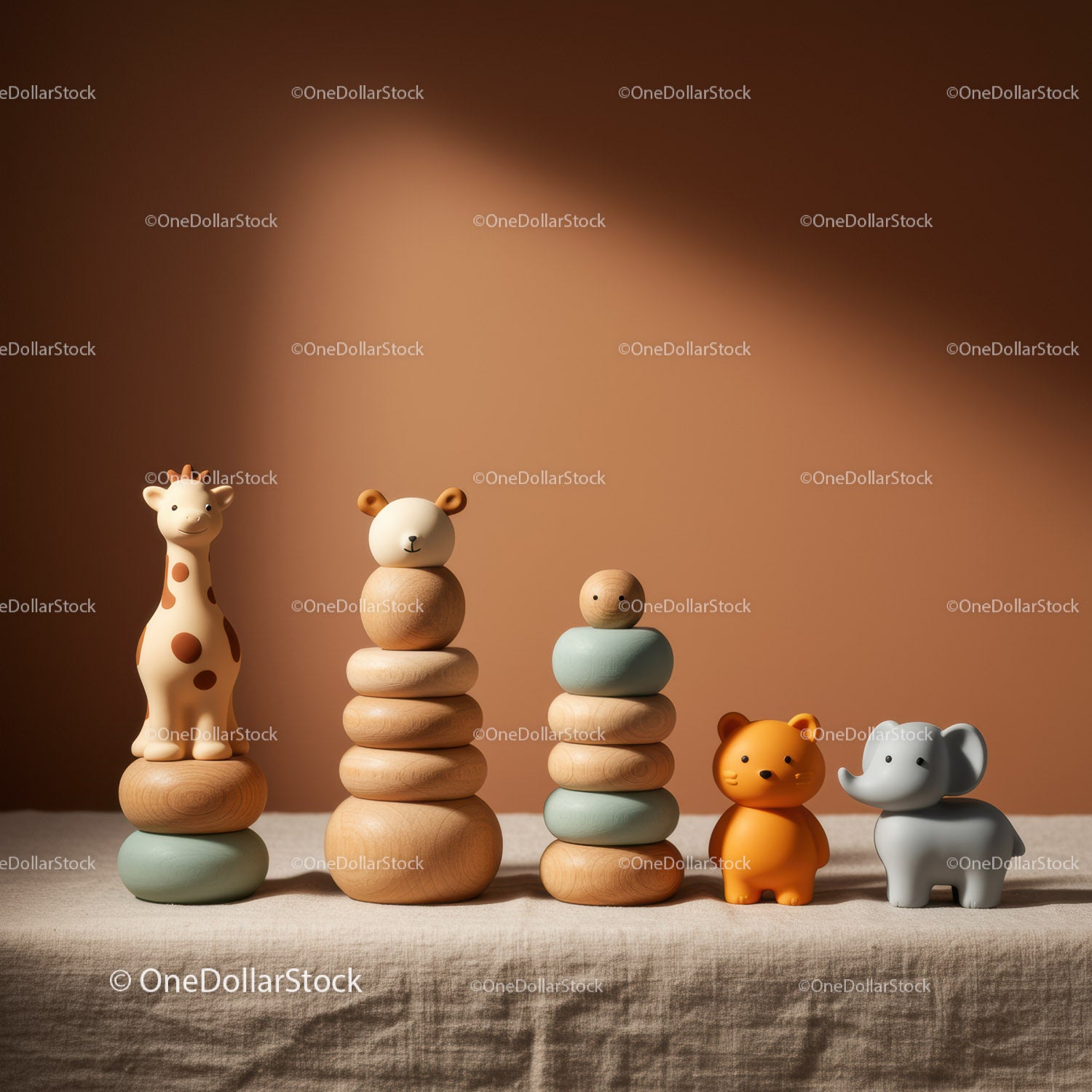Wooden Animal Stacking Toys on Beige Fabric Surface