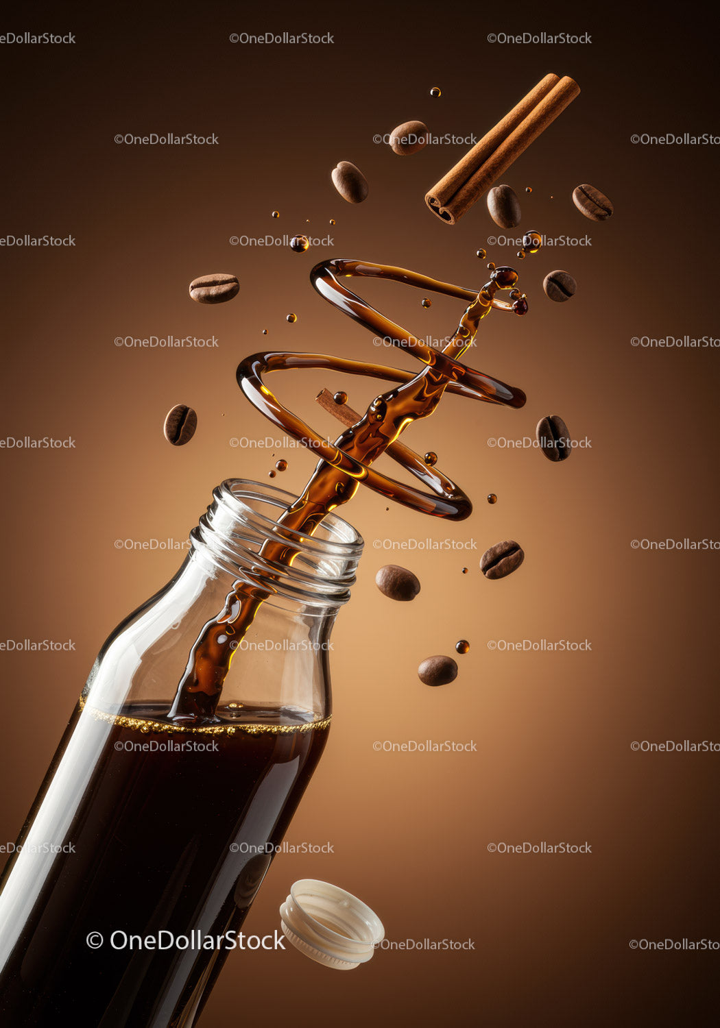 Coffee Splash with Spices and Beans in Glass Bottle