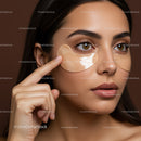 Close-up of a woman applying hydrogel eye patches for skincare rejuvenation
