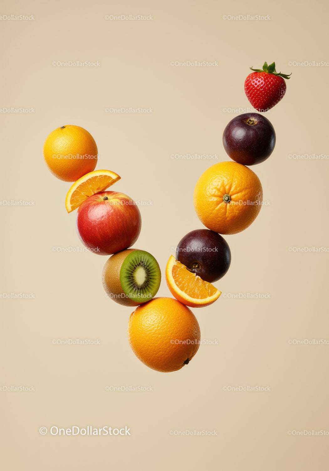 Fresh mixed fruits suspended on beige background