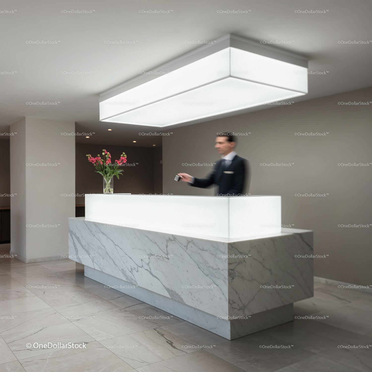 Modern hotel reception with marble desk and receptionist