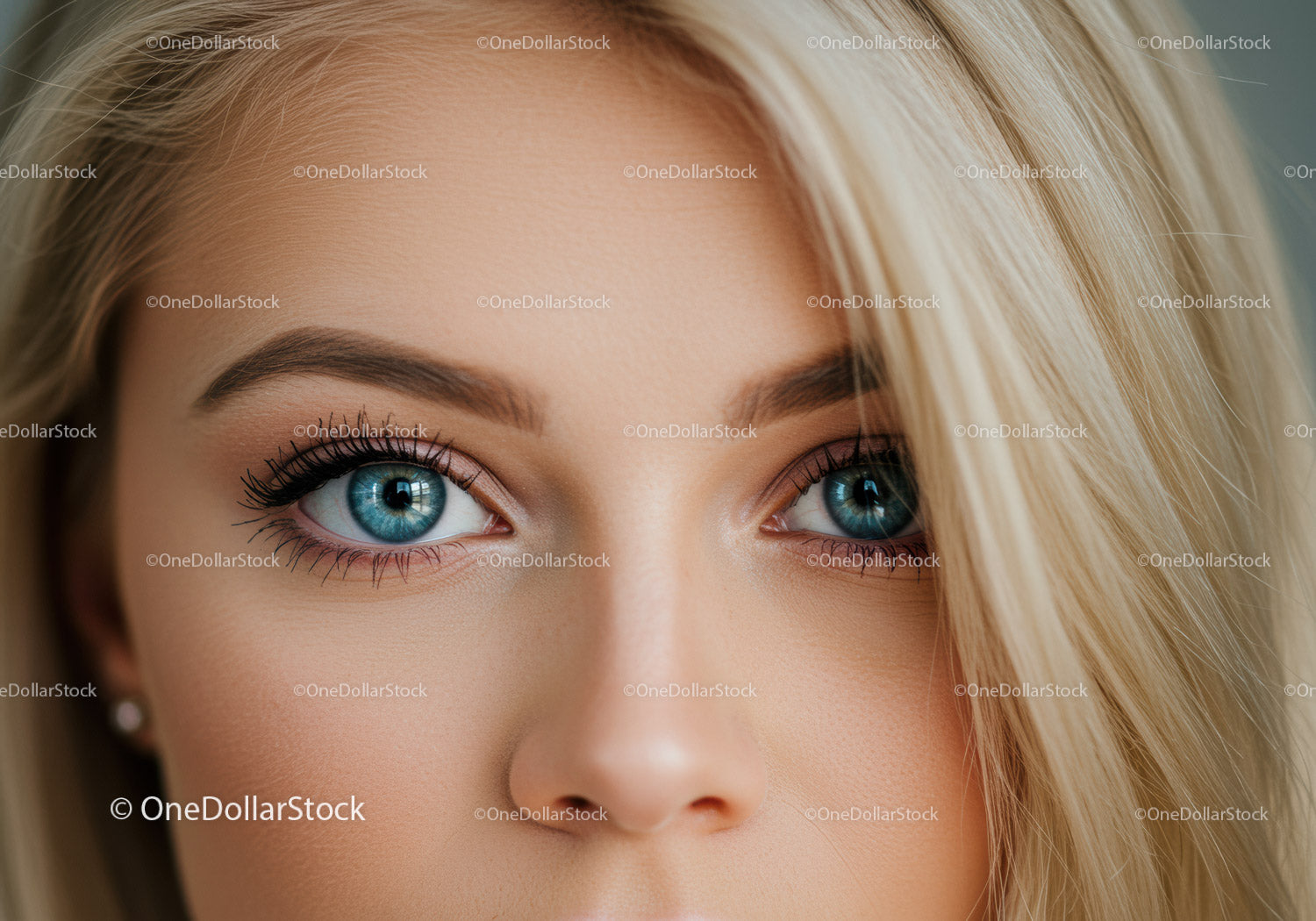 Close up of blue eyes and blonde hair woman