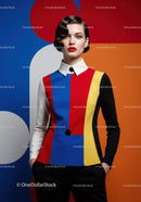 Stylish woman in colorful geometric fashion outfit