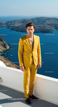 Man in Yellow Suit Poses by Scenic Blue Seaside