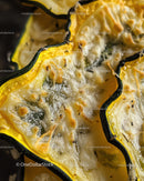 Close-up of Grilled Zucchini Slices with Black Edges and Yellow Border