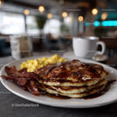 Stack of Fluffy Pancakes with Bacon and Syrup in Cozy Breakfast Setting