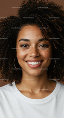 Portrait of a Smiling African American Woman with Curly Hair