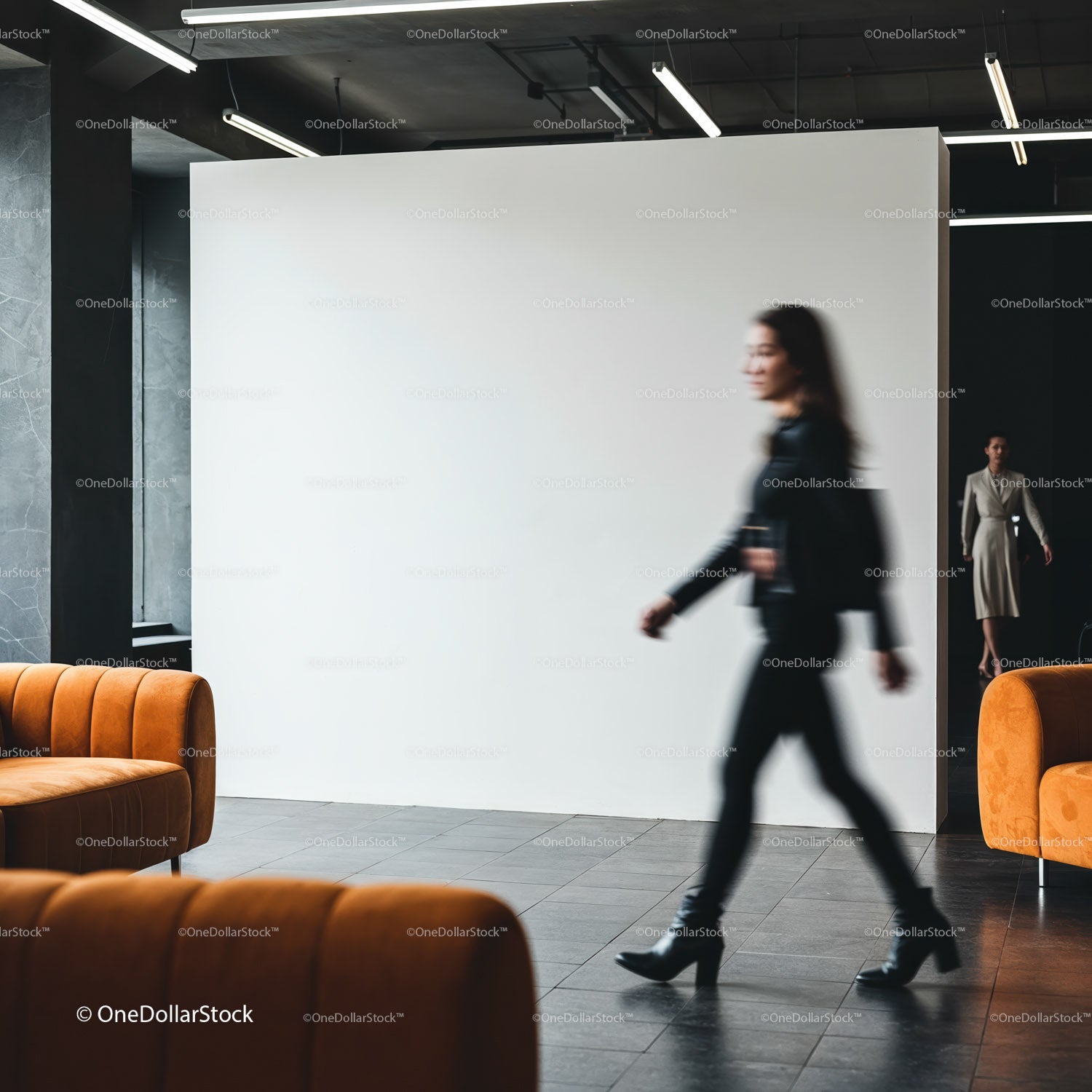 Blurred figure walking in modern minimalist lounge interior