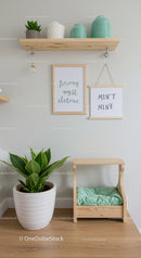 Minimalist Indoor Decor with Houseplant and Wall Art