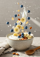 Fresh yogurt bowl with banana slices blueberries and almonds