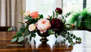 Elegant floral centerpiece with peonies and roses