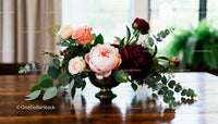 Elegant floral centerpiece with peonies and roses