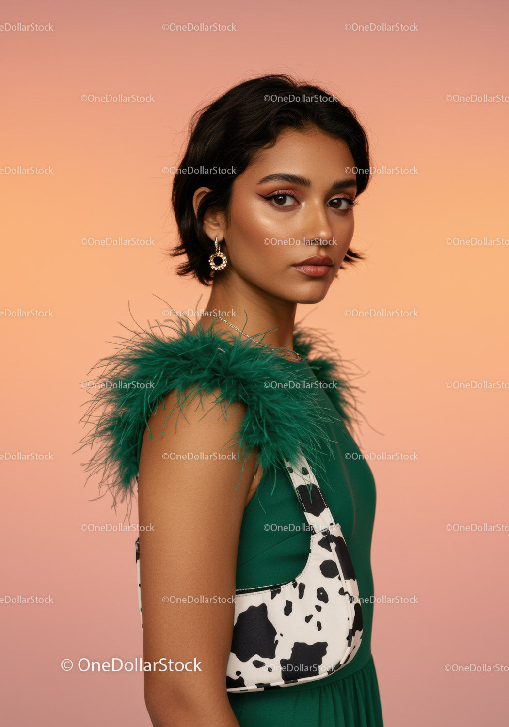 Elegant Woman in Green Dress with Feathers and Jewelry