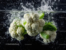 Fresh Cauliflower Heads with Green Leaves for Healthy Cooking