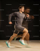 Athlete sprinting indoors wearing fitness apparel