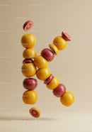 Creative letter K made of stacked citrus fruits