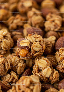 Close-up of crunchy granola clusters with oats and nuts
