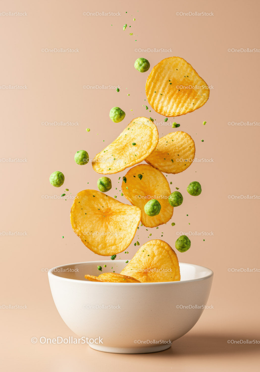 Crispy Potato Chips and Green Peas Falling Into Bowl