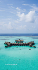 Overwater Bungalows in Tropical Paradise with Turquoise Water