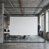 Modern office space with glass meeting room and blank board