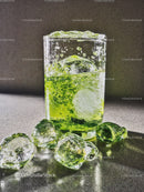 Refreshing Green Drink with Ice Cubes in Glass