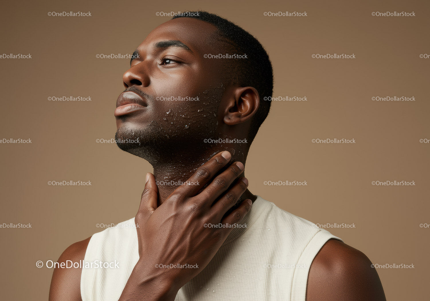 Portrait of a Young Man Applying Face Moisturizer with Smooth Skin