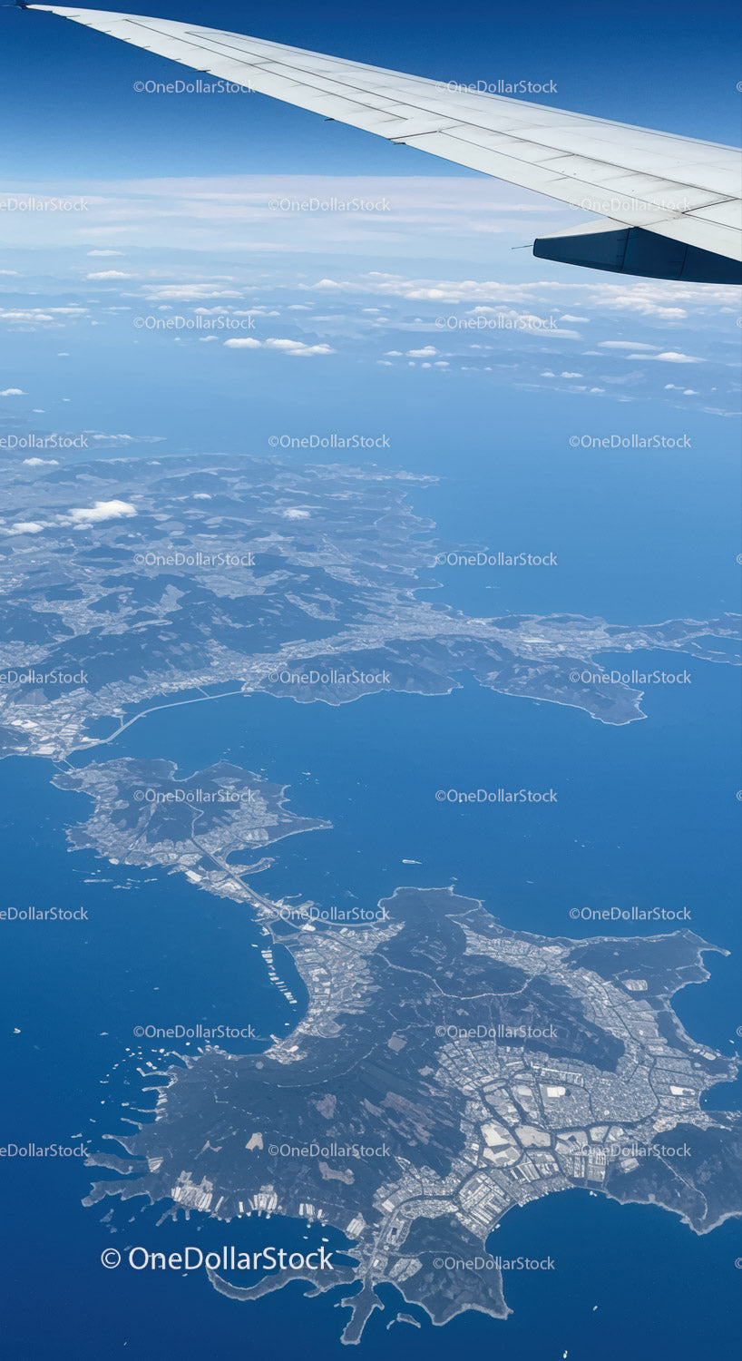 Aerial View of Coastal Islands and Ocean from Airplane Window