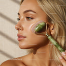 Close-Up of a Woman Using Jade Roller for Facial Rejuvenation
