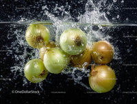 Fresh Green and Brown Onions Splashing Water Underwater Scene