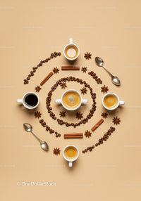 Assorted coffee cups with spices and beans arrangement