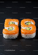 Fresh salmon sushi rolls with cucumber slice filling